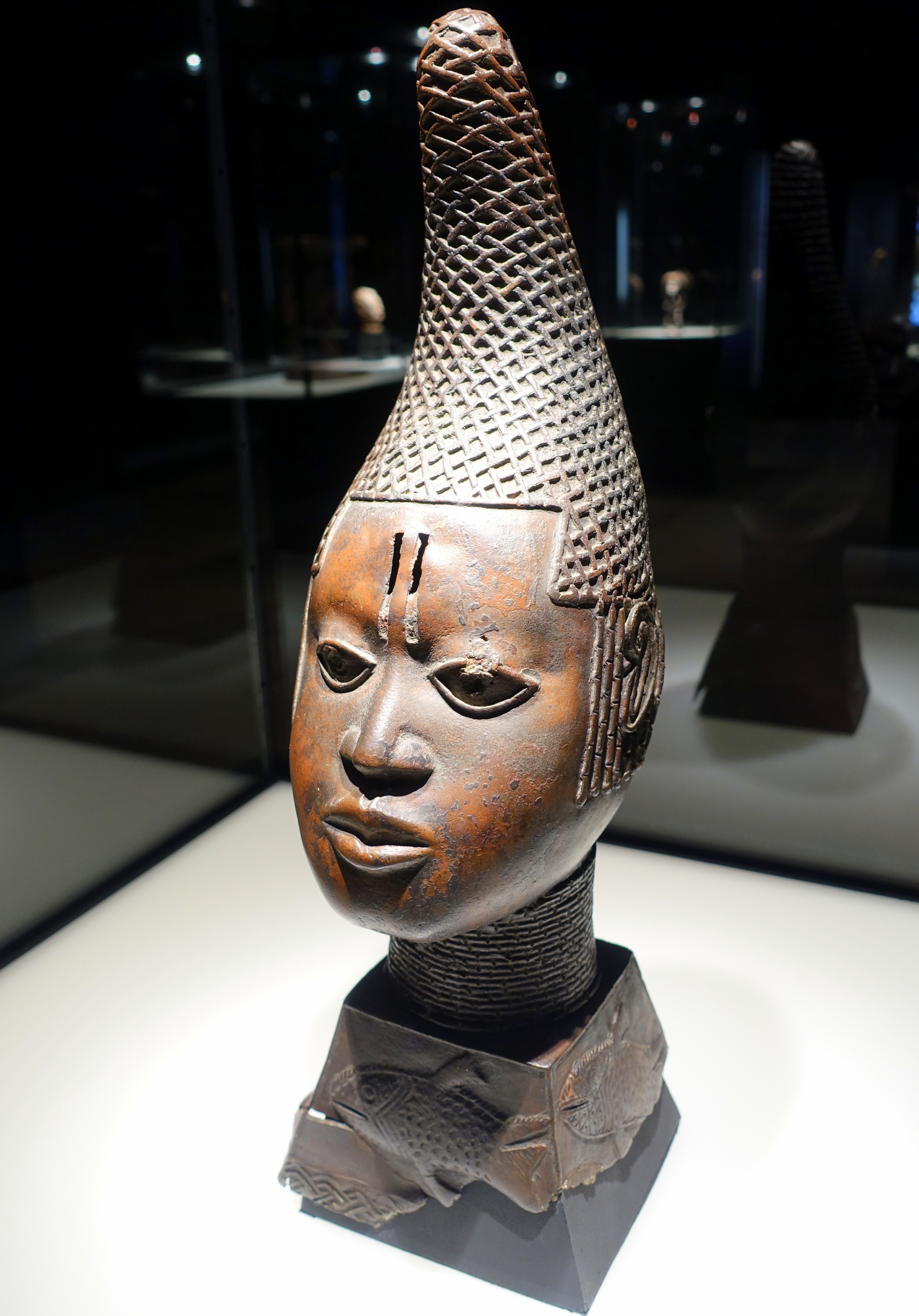 Benin bronze head of a queen mother with coral bead regalia