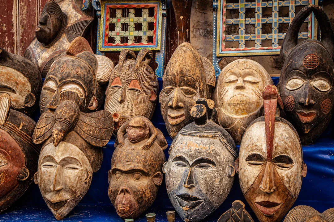 African wooden mask with bead and shell decoration
