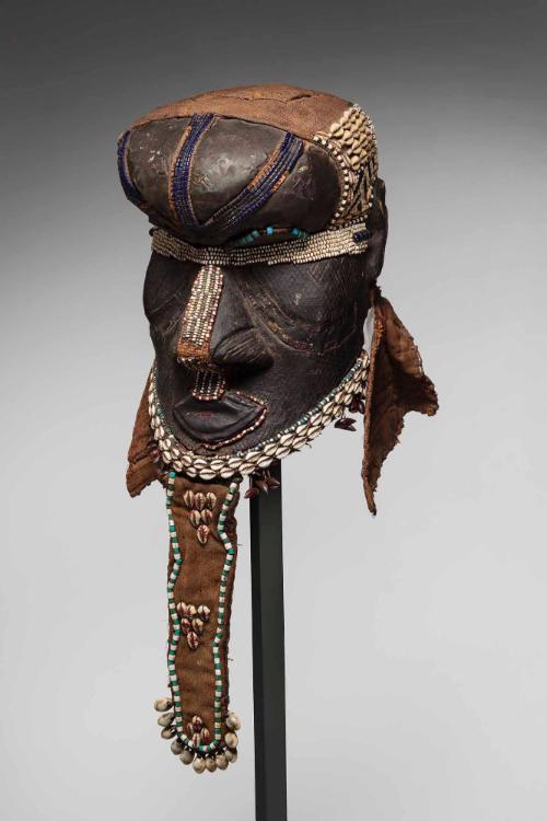 Mboom helmet mask with geometric patterns and shell decoration